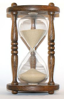 http://upload.wikimedia.org/wikipedia/commons/thumb/7/70/Wooden_hourglass_3.jpg/220px-Wooden_hourglass_3.jpg